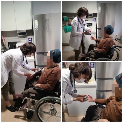 마포구 어르신 댁에 방문해 재택의료 서비스를 제공하는 의료진